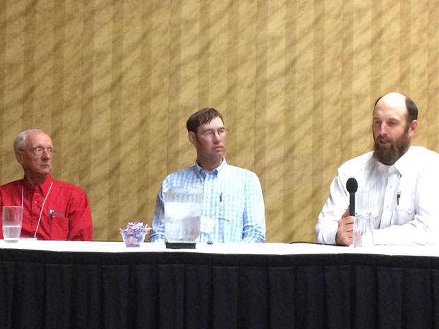 During a panel discussion at the 2018 Nebraska Grazing Conference held in Kearney, Nebraska, this week, ranchers who graze multiple species discuss their experiences with conference attendees. From left to right are Mike Wallace, Sage Askin and Brock Terrell. (DTN photo by Russ Quinn)